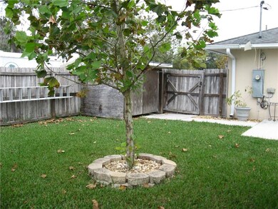 BACK YARD FENCNED AND WITH ENTRANCE GATE