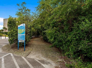 Beach access steps away from this home.