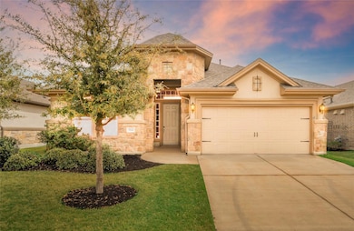 View of front of property with stone siding, an a