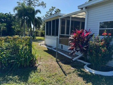 View of yard featuring a sunroom