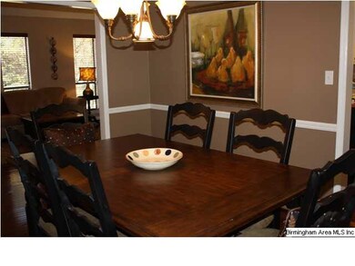 Formal Dining Room with chair rail, crown molding,