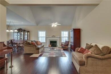 Living room opens to formal dining room.