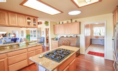 Laundry/service entrance between the garage and breezeway heads into the kitchen.