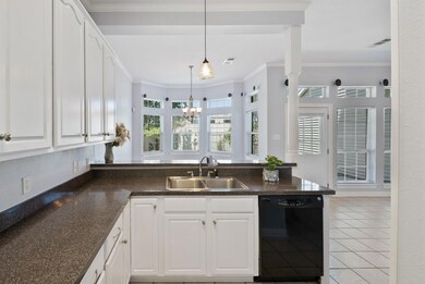 Breakfast bar separates the kitchen from the dinin