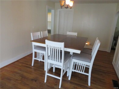 BRIGHT FORMAL DINING , LEFT TO THE KITCHEN, RIGHT 