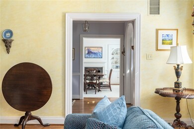 Living room through foyer to Dining