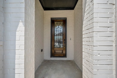 Approaching the front door you find a spacious fro