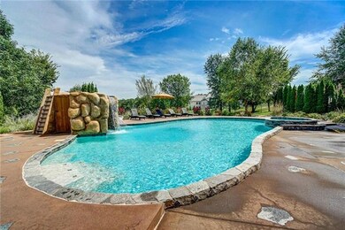 SALT WATER POOL W/WATERFALL AND SLIDE