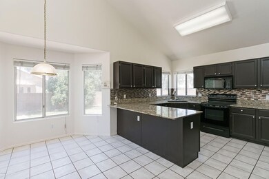 Espresso Cabinets & Granite
