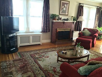 Living Room. Gorgeous oak hardwoods with mahogany