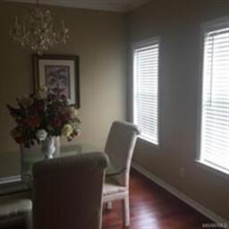 Separate dining room with beautiful hardwood floor