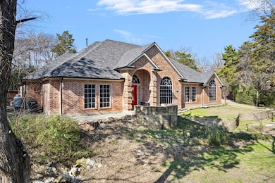 View of front of property featuring brick siding, 