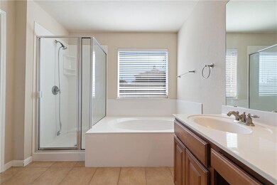 Full bathroom featuring a stall shower, healthy a