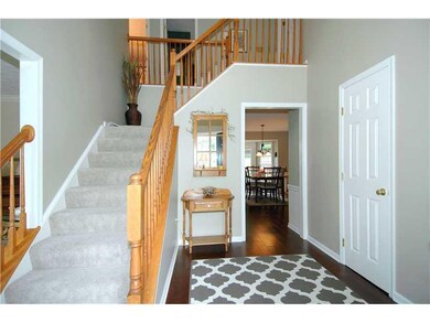 Entry/Foyer. Striking two-story foyer with turned 