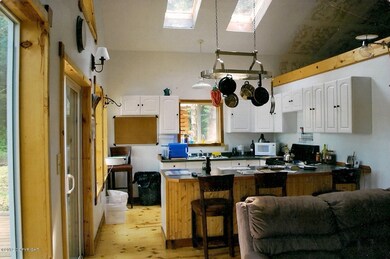 Kitchen with Breakfast Bar and Skylights