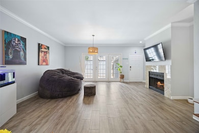 Spacious living/dining area with abundance of natu