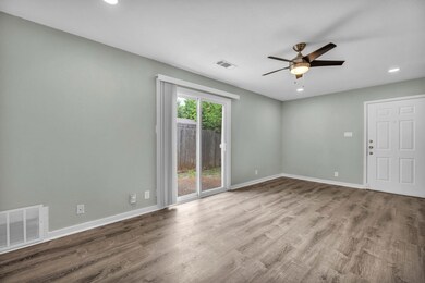 Spare room featuring a ceiling fan, baseboards, r