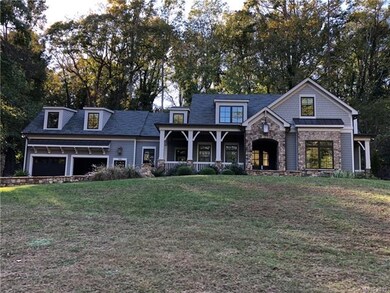 Newer custom home immediately to the left