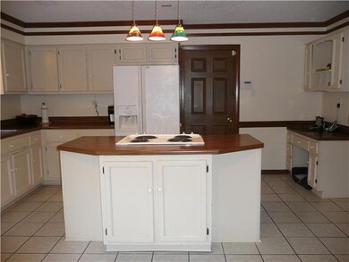 Large, open & airy kitchen offers tile flooring, c