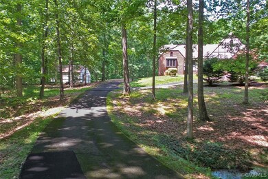 Charming private drive winds to home situated nice