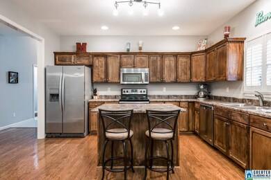 Features gleaming hardwoods, new stainless applian