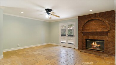 Living room off kitchen leading to back yard