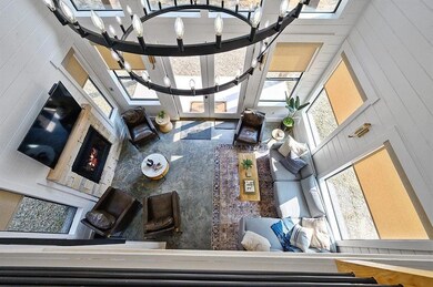Living room with a healthy amount of sunlight, an 