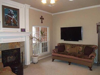 Living Room. Large windows looking out to private back area backing up to wilderness