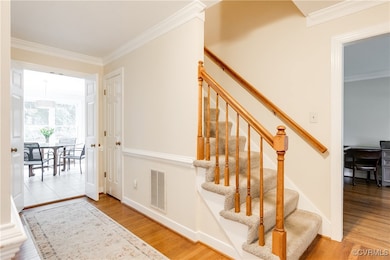 Hardwood floors, carpeted stairs