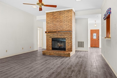 The gas fireplace provides a warm, cozy feel to the formal living room.