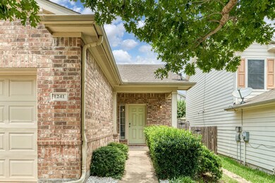Entrance to property featuring a garage