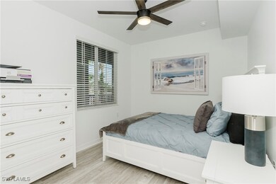 Bedroom featuring light wood-style flooring and a ceiling fan
