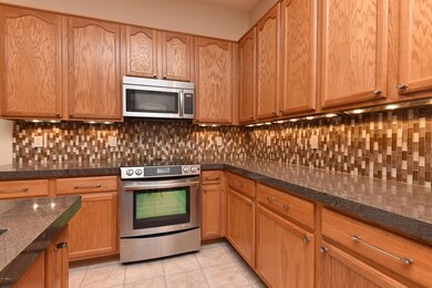 Kitchen with stainless appliances.