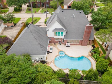 This custom home has an automatic gated 3 car porte cochere, 3 car garage, and a crystal pool & spa,