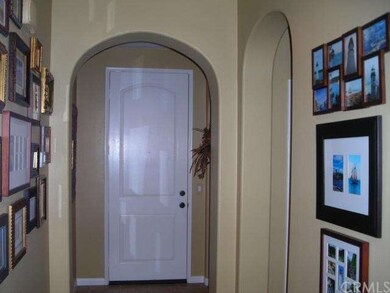 Front entry door from the interior hallway.
