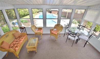 Gorgeous enclosed porch/sunroom...