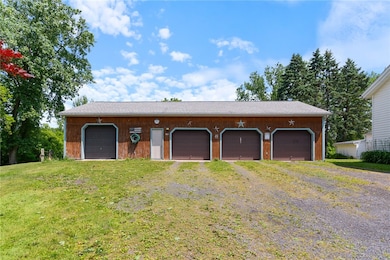 (4) car garage, (1) bay with heated floor!