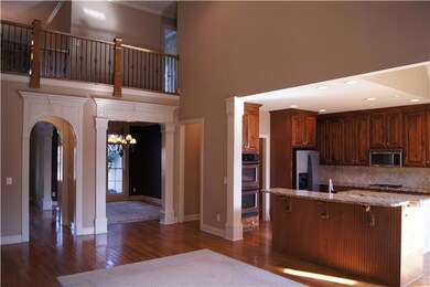 Looking down from the catwalk into the living room/kitchen