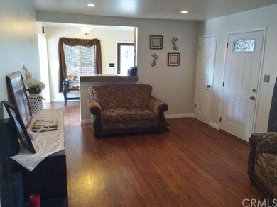 spacious living room opens to kitchen & dining roo