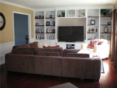 Family Room. Handsome built-in book shelves