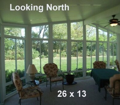 Enjoy panoramic views of the yard and double tree line in all four seasons.