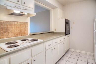 Kitchen with  Cooktop, Range, Refrigerator, Dishwa