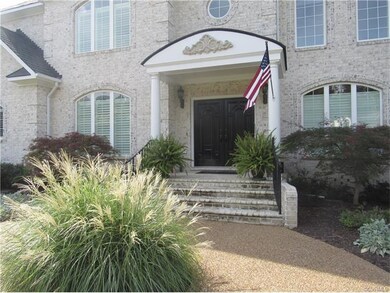 Dramatic double front door entry!