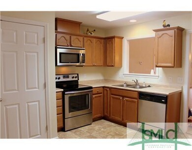 Kitchen. Cut through window to dining area - back 