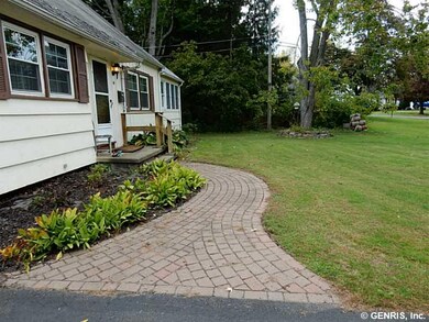 Exterior Front Interlocking brick walkway takes yo