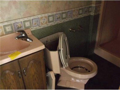 Exterior Front. Powderroom off Familyroom