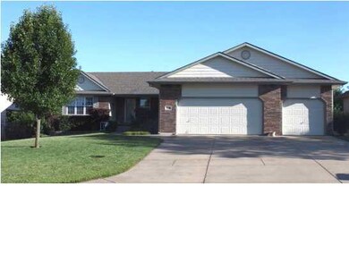 BEAUTIFUL MANICURED LAWN WITH LANDSCAPING, SPRINKL