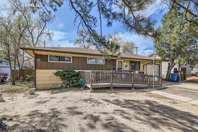Ranch-style home with board and batten siding, dri