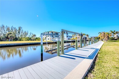 Boat lift (two), trex docking, seawall, covered bo