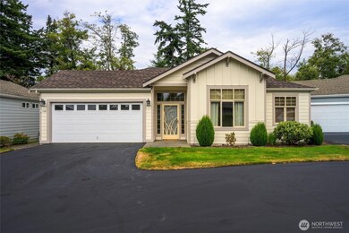 An ideally situated stand-alone condo that backs up to a creek and greenspace.